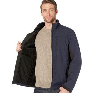 Tumi Stretch Soft-shell Jacket w/Faux-fur lining.